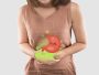Cartoon stomach in the woman belly filled with gas the cause of flatulence and stomach ache, inflammatory bowel disease, Irritable Bowel Syndrome